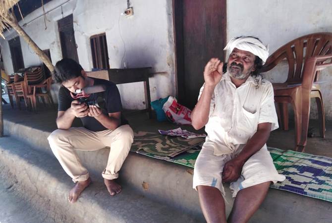Interviewing Cheruvayal Raman at his village in Wayanad