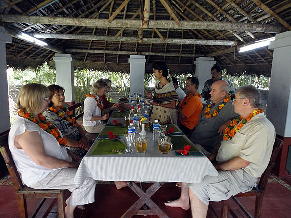 Tourists having traditional Kerala lunch at Kandath Tharavadu Homestay in Kerala